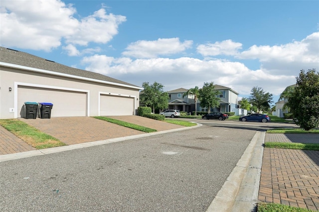 6013 Blue Lily Way, Winter Garden, FL 34787 - view of asphalt road featuring a residential view and curbs