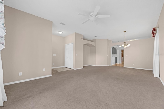 1868 Rachels Ridge Loop Unit L, Ocoee, FL 34761 - unfurnished living room featuring arched walkways, a ceiling fan, and carpet floors