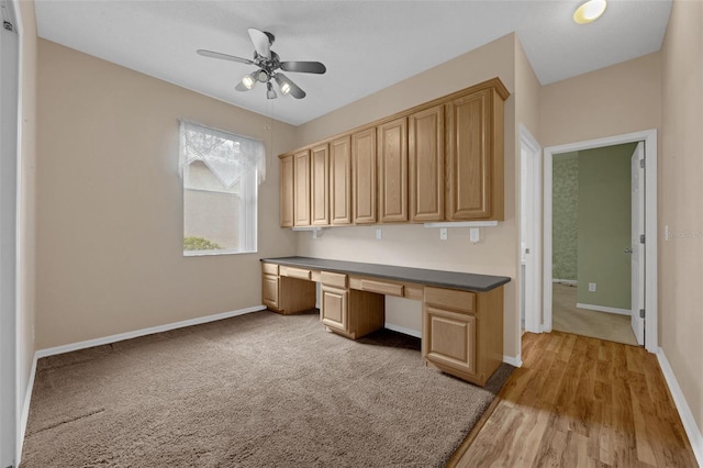 1868 Rachels Ridge Loop Unit L, Ocoee, FL 34761 - unfurnished office featuring built in desk, a ceiling fan, and light wood-type flooring