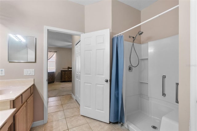 1868 Rachels Ridge Loop Unit L, Ocoee, FL 34761 - bathroom with vanity, a shower with shower curtain, and tile patterned flooring