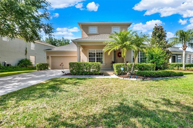 traditional-style home with concrete driveway, a front lawn, an attached garage, stucco siding, and roof with shingles