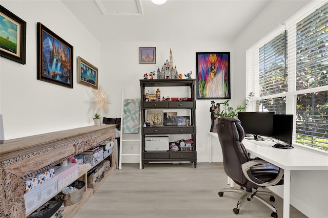 office area with wood finished floors