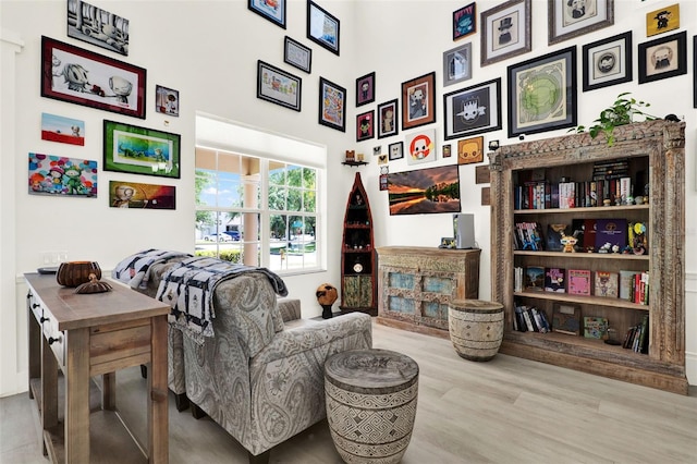 sitting room featuring wood finished floors