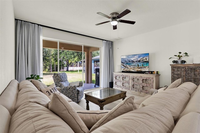 living room featuring a ceiling fan