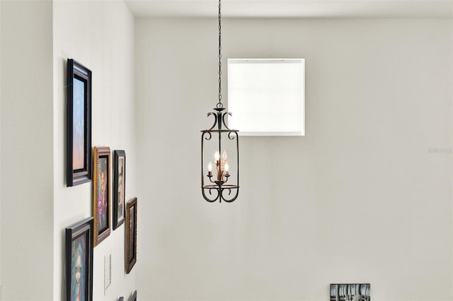 details featuring an inviting chandelier