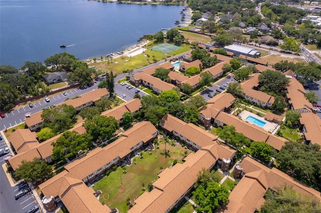 bird's eye view with a water view and a residential view