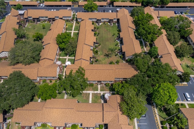 birds eye view of property with a residential view