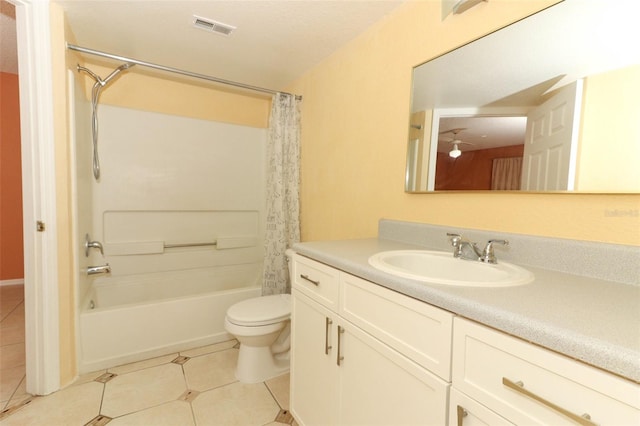 full bathroom featuring visible vents, shower / tub combo with curtain, toilet, vanity, and tile patterned flooring