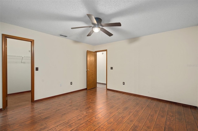 1105 Mill Run Cir, Apopka, FL 32703 - unfurnished room featuring ceiling fan, hardwood / wood-style flooring, baseboards, and a textured ceiling