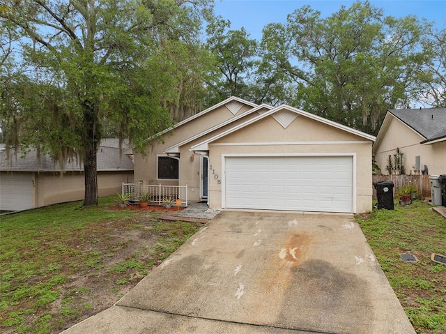 1105 Mill Run Cir, Apopka, FL 32703 - single story home featuring stucco siding, concrete driveway, a garage, and fence