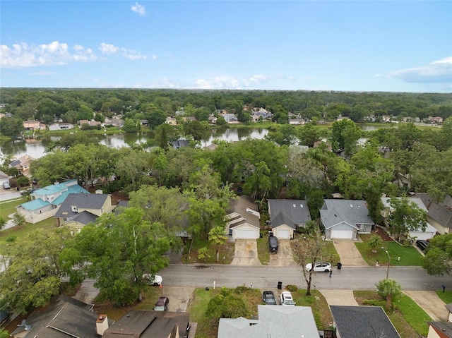 1105 Mill Run Cir, Apopka, FL 32703 - aerial view of property's location with a large body of water, nearby suburban area, and a tree filled landscape
