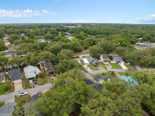 1105 Mill Run Cir, Apopka, FL 32703 - aerial overview of property's location with nearby suburban area and a forest