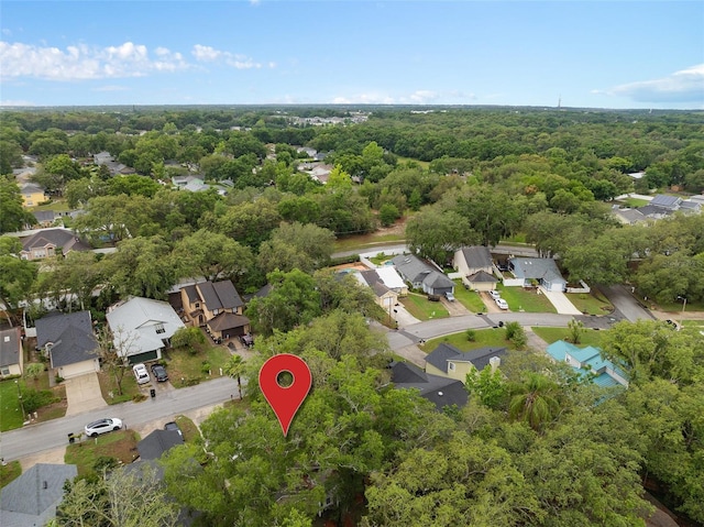 1105 Mill Run Cir, Apopka, FL 32703 - aerial overview of property's location with nearby suburban area and a heavily wooded area