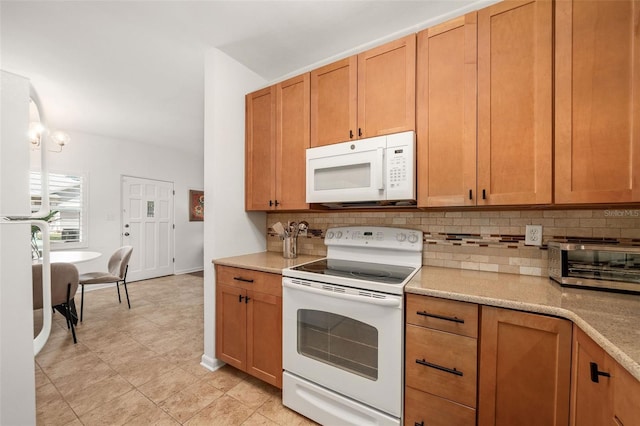 1424 W New Hampshire St, Orlando, FL 32804 - kitchen with decorative backsplash, brown cabinets, light countertops, a toaster, and white appliances
