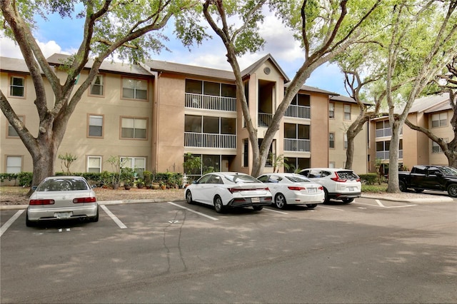 956 Salt Pond Pl Unit 207, Altamonte Springs, FL 32714 - view of property with uncovered parking
