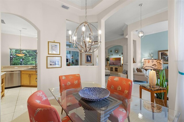 dining area with arched walkways, visible vents, an inviting chandelier, ornamental molding, and light tile patterned floors