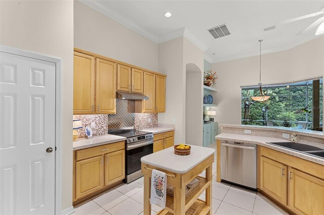 kitchen featuring light brown cabinetry, under cabinet range hood, stainless steel appliances, visible vents, and light tile patterned floors