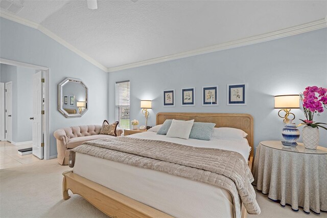carpeted bedroom with lofted ceiling, crown molding, visible vents, and baseboards