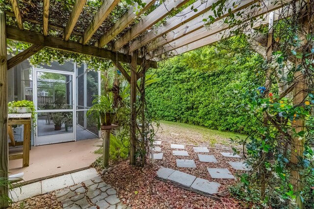 view of yard featuring a pergola and a patio area