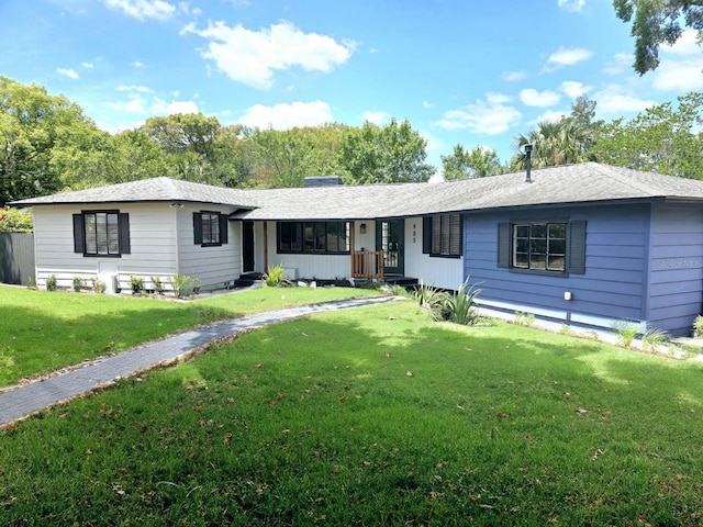 905 W 11th Ave, Mount Dora, FL 32757 - ranch-style house with a front lawn and covered porch