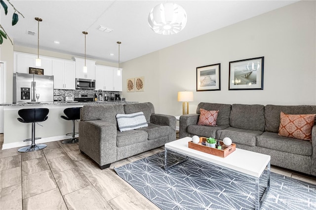9025 Dogleg Dr, Davenport, FL 33896 - living area with recessed lighting and visible vents