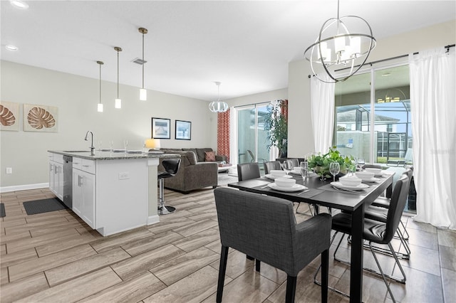 9025 Dogleg Dr, Davenport, FL 33896 - dining room featuring baseboards, recessed lighting, a chandelier, visible vents, and wood finish floors