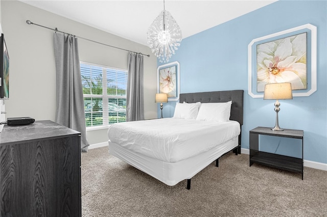 9025 Dogleg Dr, Davenport, FL 33896 - bedroom featuring baseboards, carpet flooring, and a chandelier