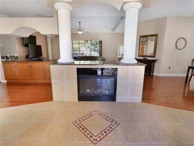 4675 Ficus Dr, Beverly Hills, FL 34465 - interior space with ornate columns, wood finished floors, and a ceiling fan