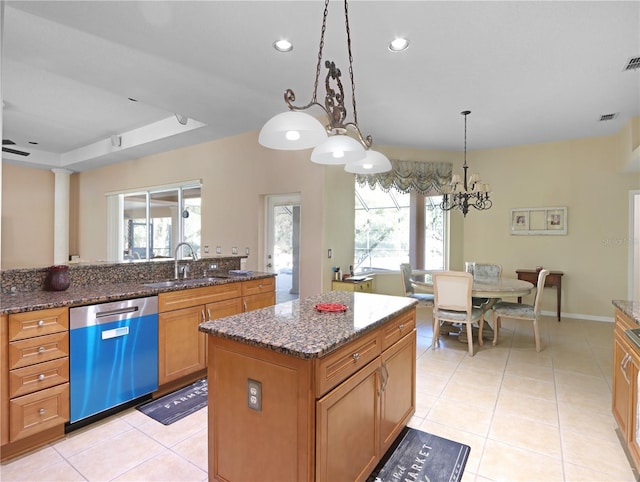 4675 Ficus Dr, Beverly Hills, FL 34465 - kitchen with dishwashing machine, a healthy amount of sunlight, a kitchen island, and a sink