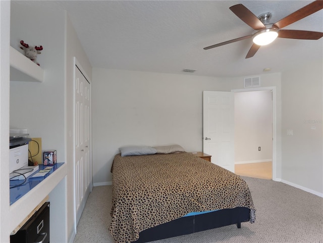 4675 Ficus Dr, Beverly Hills, FL 34465 - bedroom featuring a closet, a ceiling fan, visible vents, baseboards, and light colored carpet