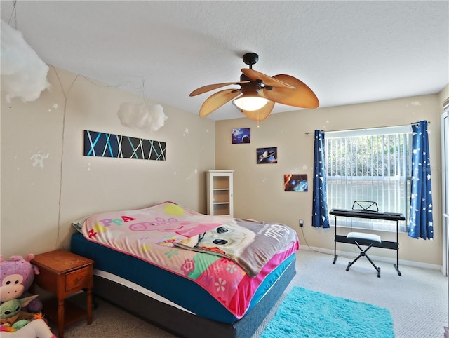 4675 Ficus Dr, Beverly Hills, FL 34465 - bedroom with a textured ceiling, ceiling fan, carpet floors, and baseboards