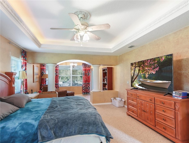 4675 Ficus Dr, Beverly Hills, FL 34465 - bedroom with a tray ceiling, visible vents, multiple windows, and ornate columns