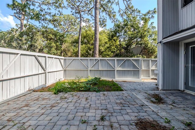 121 Primrose Dr, Longwood, FL 32779 - fenced backyard featuring a patio