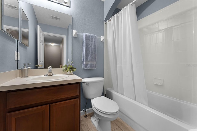 16064 Old Ash Loop, Orlando, FL 32828 - bathroom with visible vents, shower / tub combo with curtain, vanity, toilet, and tile patterned floors