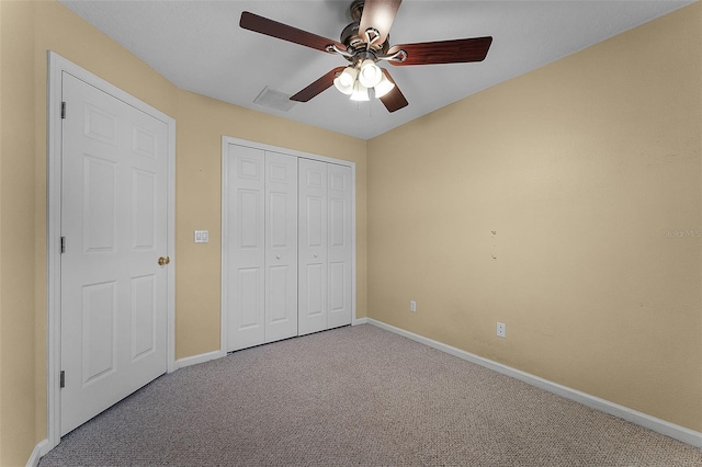 16064 Old Ash Loop, Orlando, FL 32828 - unfurnished bedroom with baseboards and carpet flooring