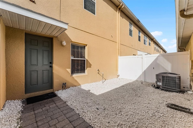 16064 Old Ash Loop, Orlando, FL 32828 - exterior space featuring central air condition unit and fence