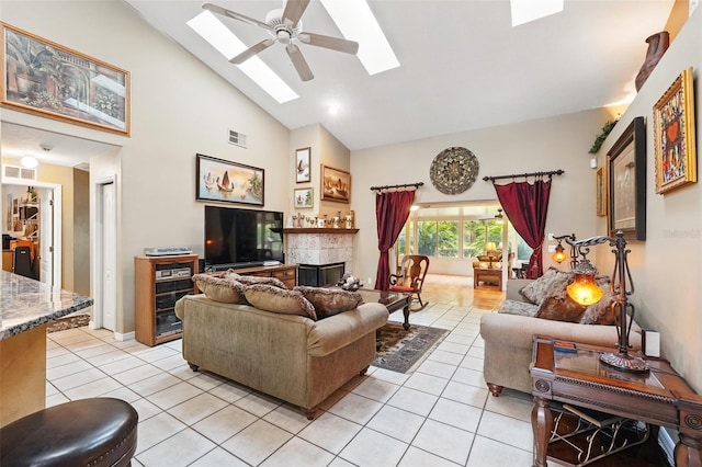 1714 Sweetwater W Cir, Apopka, FL 32712 - living area featuring high vaulted ceiling, a skylight, visible vents, and light tile patterned floors