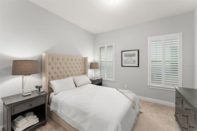8017 Chilton Dr, Orlando, FL 32836 - bedroom featuring light carpet and baseboards