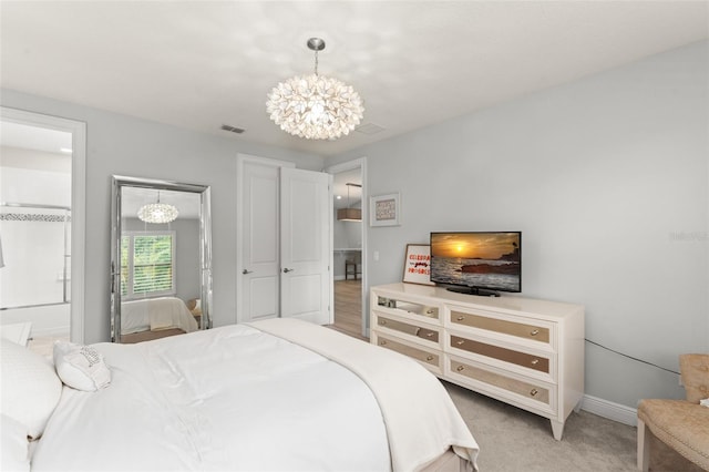 8017 Chilton Dr, Orlando, FL 32836 - bedroom featuring a chandelier, light carpet, and baseboards