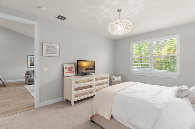 8017 Chilton Dr, Orlando, FL 32836 - bedroom featuring a chandelier and baseboards