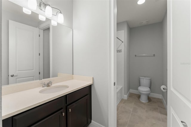 8017 Chilton Dr, Orlando, FL 32836 - bathroom featuring toilet, vanity, baseboards, shower / tub combination, and tile patterned flooring