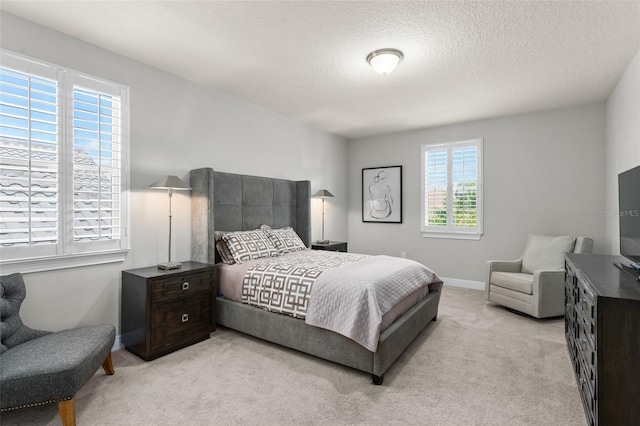 8017 Chilton Dr, Orlando, FL 32836 - bedroom featuring light colored carpet, a textured ceiling, and baseboards