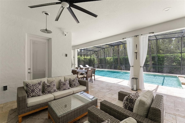 8017 Chilton Dr, Orlando, FL 32836 - swimming pool featuring an outdoor hangout area, a patio, ceiling fan, and glass enclosure