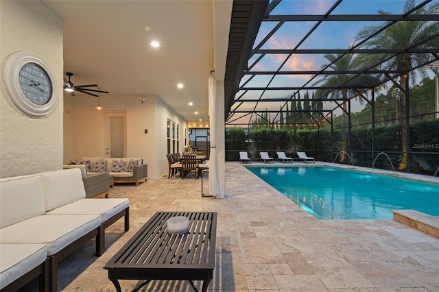 8017 Chilton Dr, Orlando, FL 32836 - pool at dusk with an outdoor living space, a patio, an outdoor pool, and ceiling fan