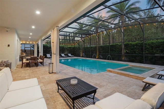 8017 Chilton Dr, Orlando, FL 32836 - view of swimming pool with a patio, glass enclosure, and outdoor lounge area