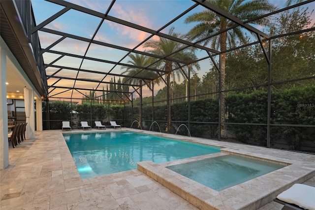 8017 Chilton Dr, Orlando, FL 32836 - view of swimming pool with a patio, a pool with connected hot tub, and a lanai