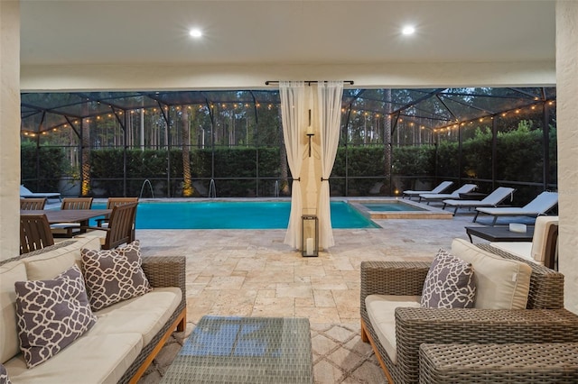 8017 Chilton Dr, Orlando, FL 32836 - outdoor pool with glass enclosure, a patio, an outdoor living space, and an in-ground hot tub