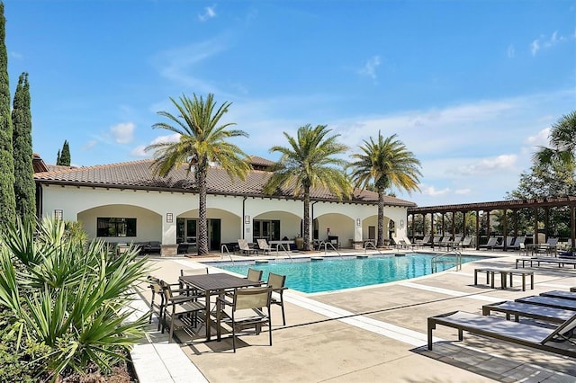 8017 Chilton Dr, Orlando, FL 32836 - community pool featuring a patio area