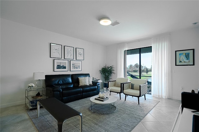 15242 Sunny Day Dr, Bradenton, FL 34211 - living area with light tile patterned flooring, visible vents, and baseboards