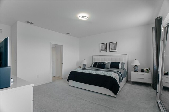 15242 Sunny Day Dr, Bradenton, FL 34211 - bedroom featuring baseboards, visible vents, and light carpet